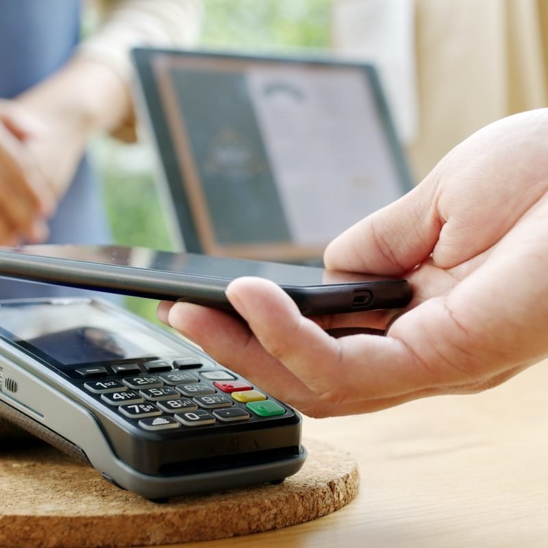 close-up-hand-asia-woman-people-work-in-small-sme-coffee-cafe-shop-store-owner-use-cashless.jpg